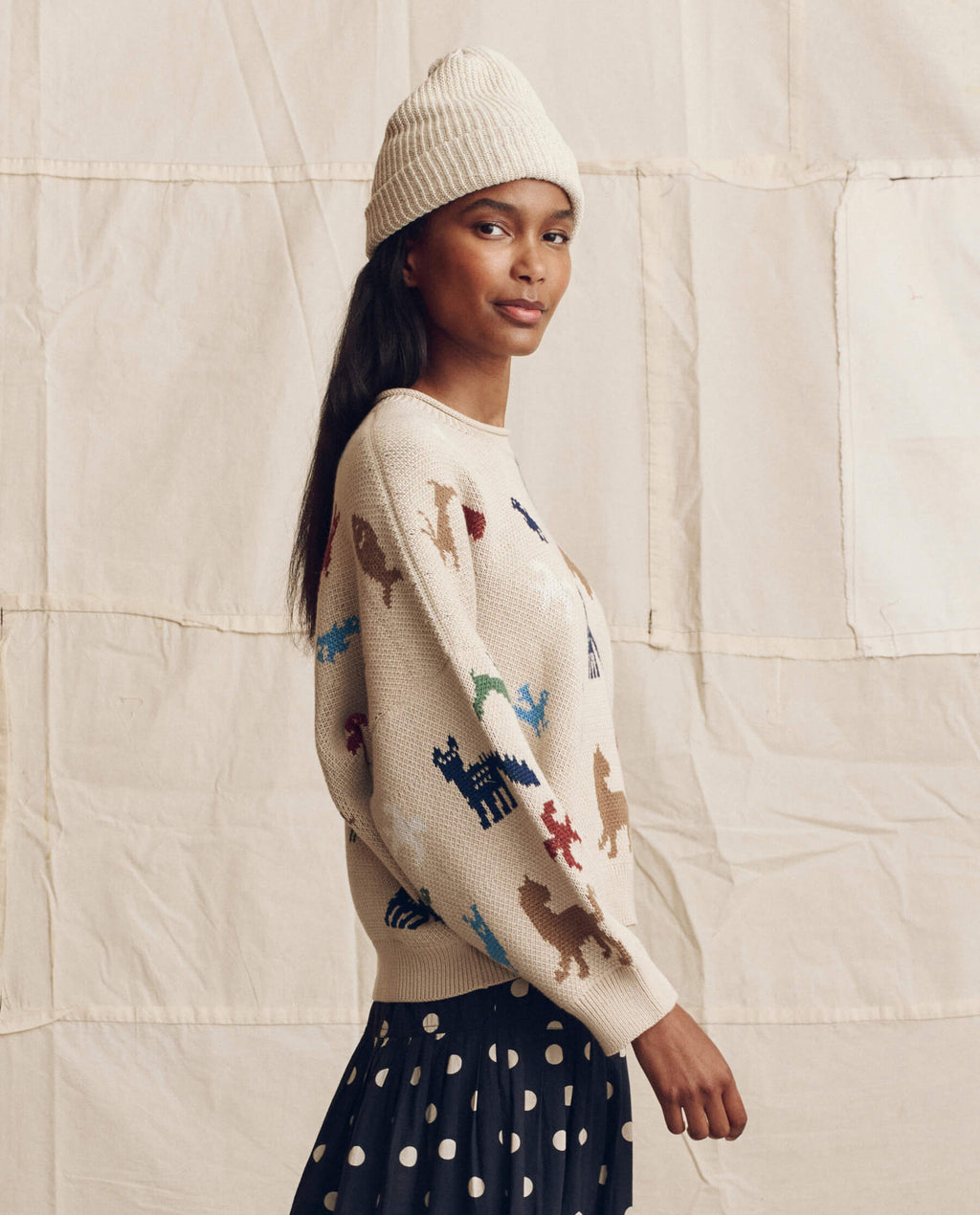 The Pictograph Roll Neck Pullover. -- Cream