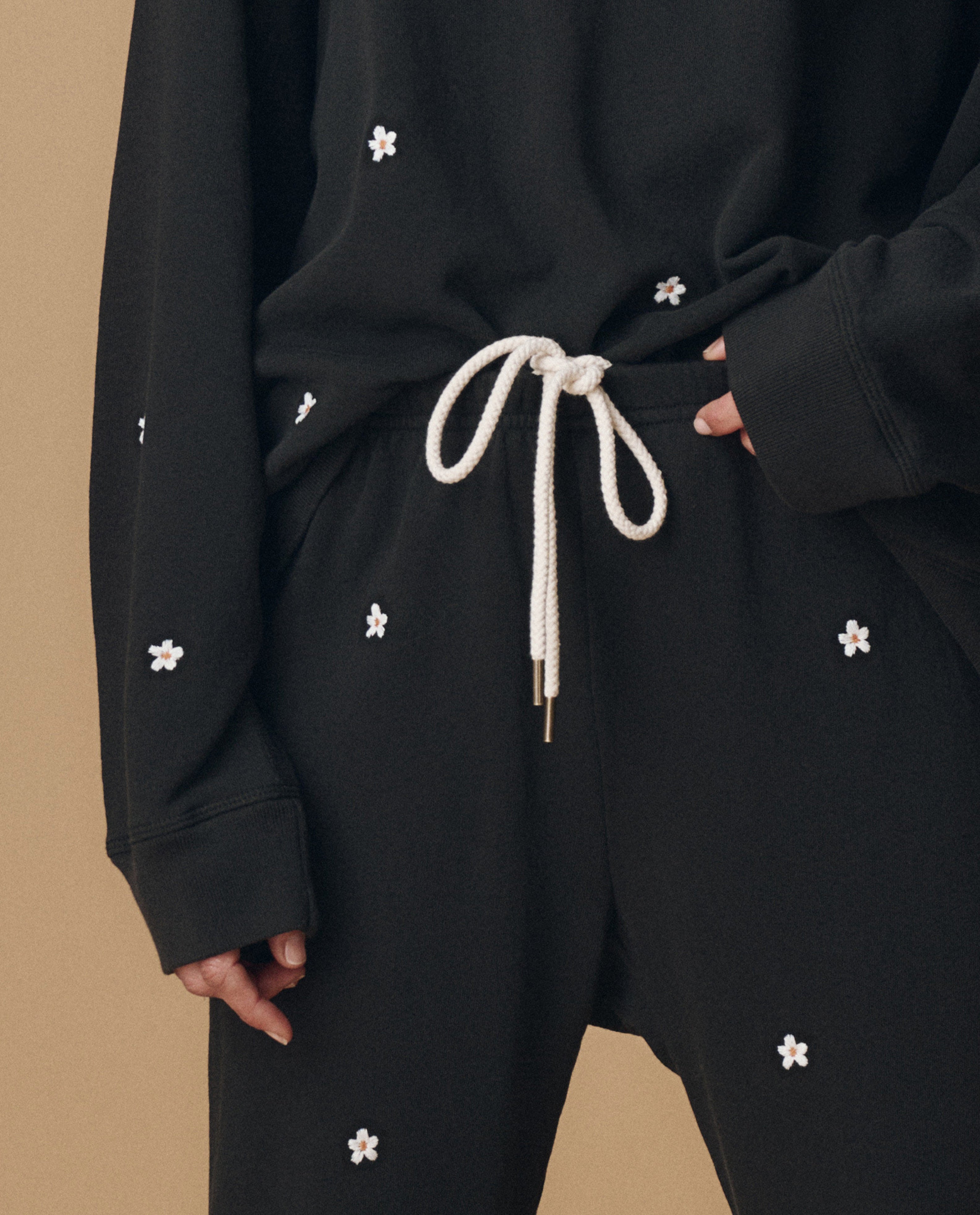 The Stadium Sweatpant. Embroidered -- Almost Black With Daisy Embroidery