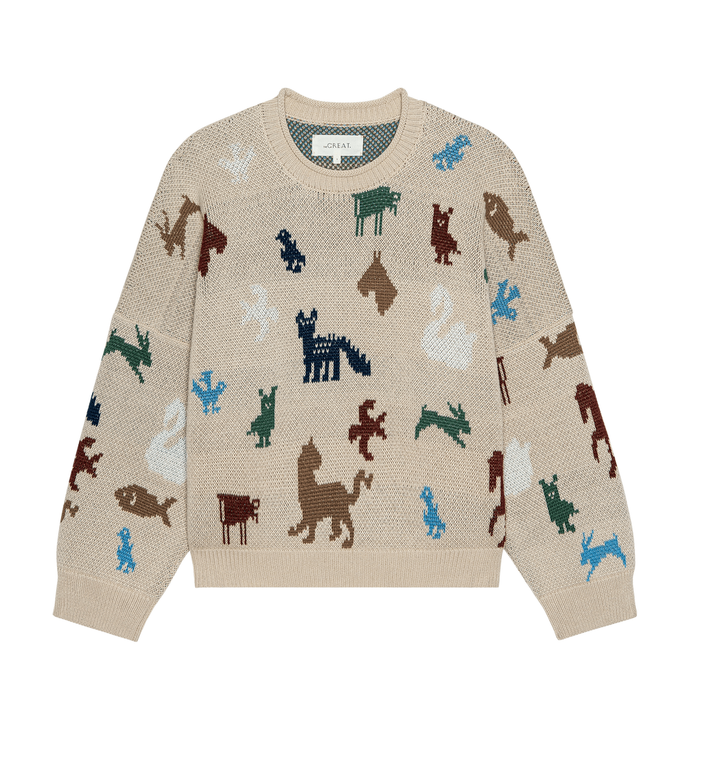 The Pictograph Roll Neck Pullover. -- Cream