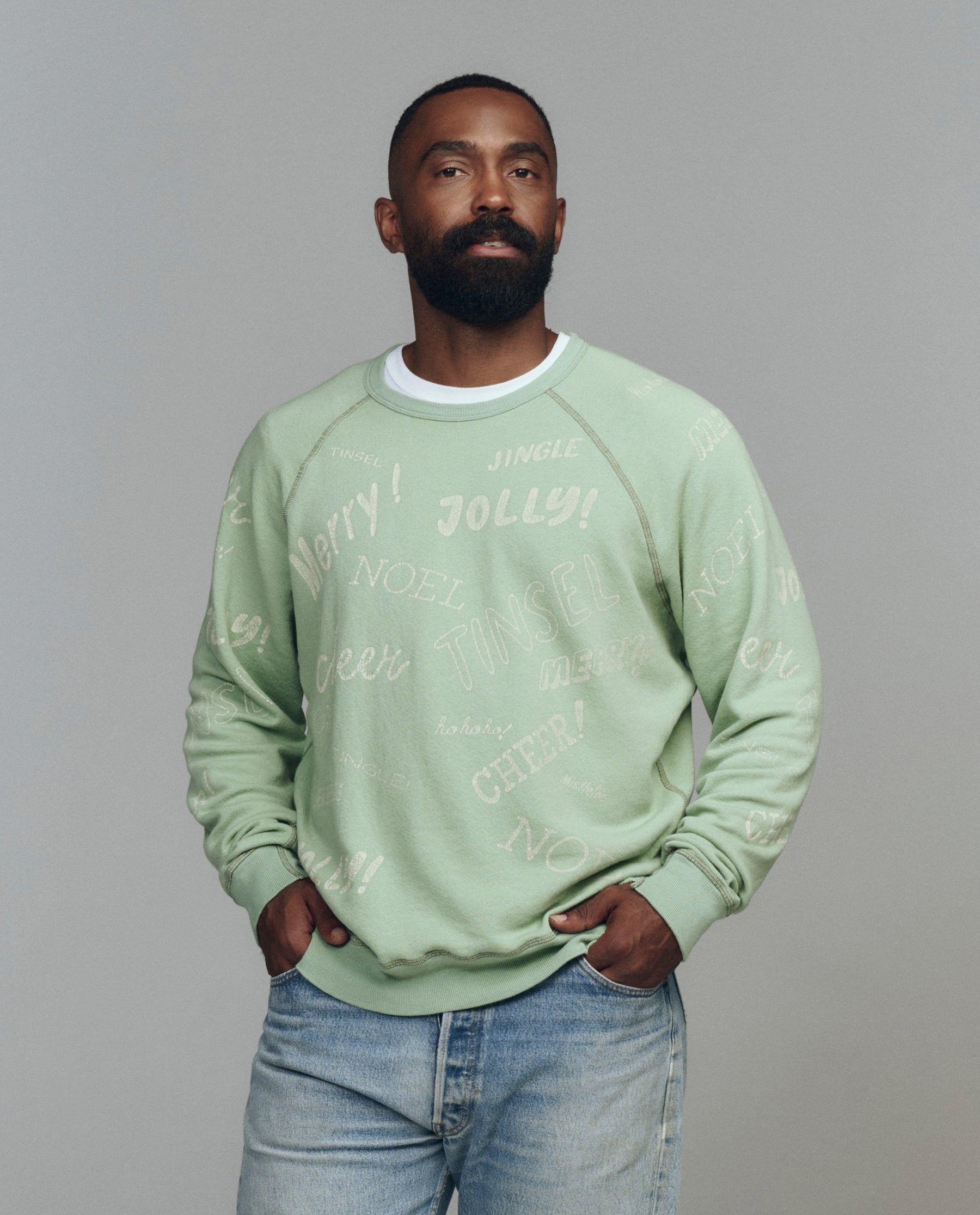 The Men's College Sweatshirt. Graphic -- Vintage Mint with Holiday Greetings Graphic