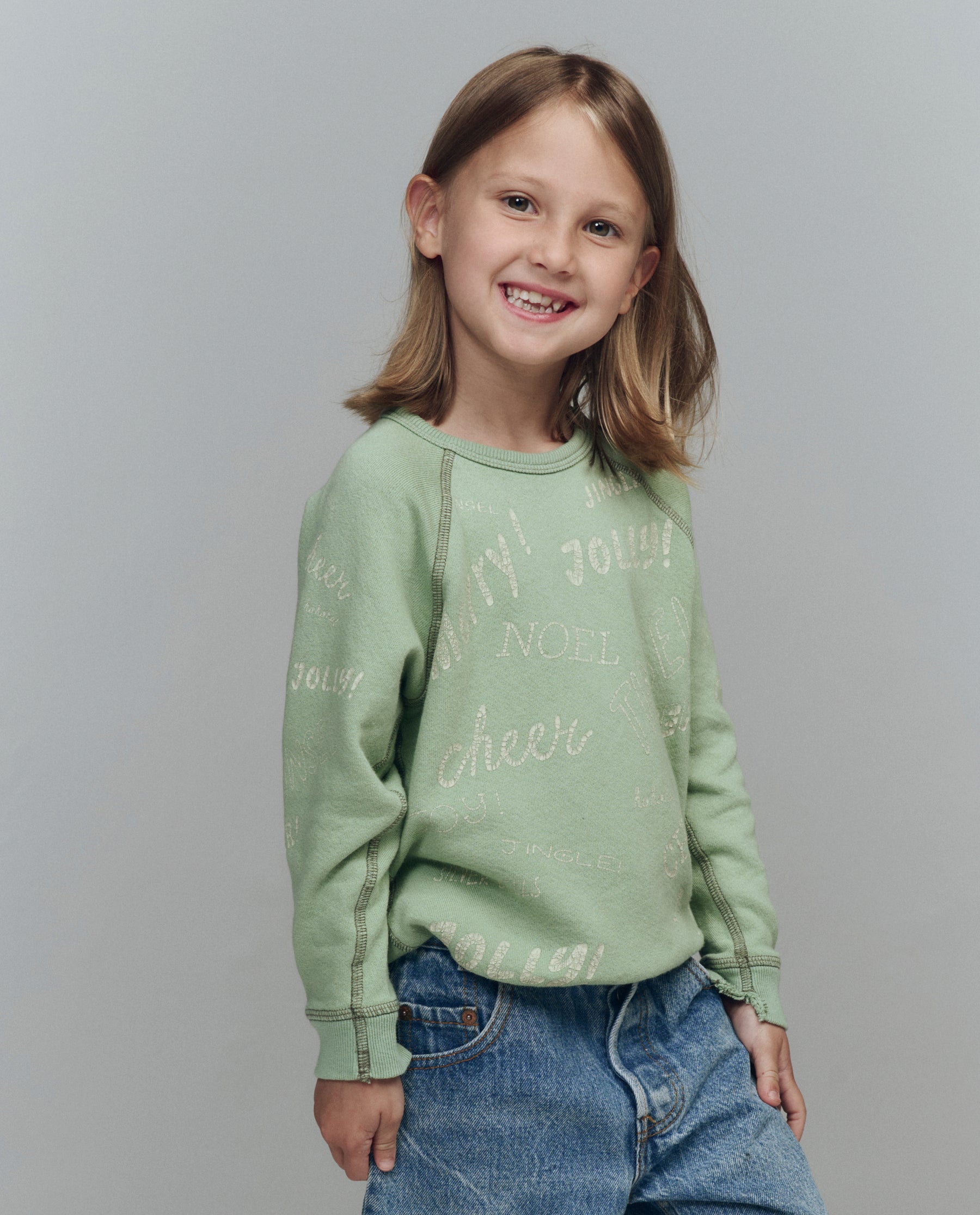 The Little College Sweatshirt. Graphic -- Vintage Mint with Holiday Greetings Graphic