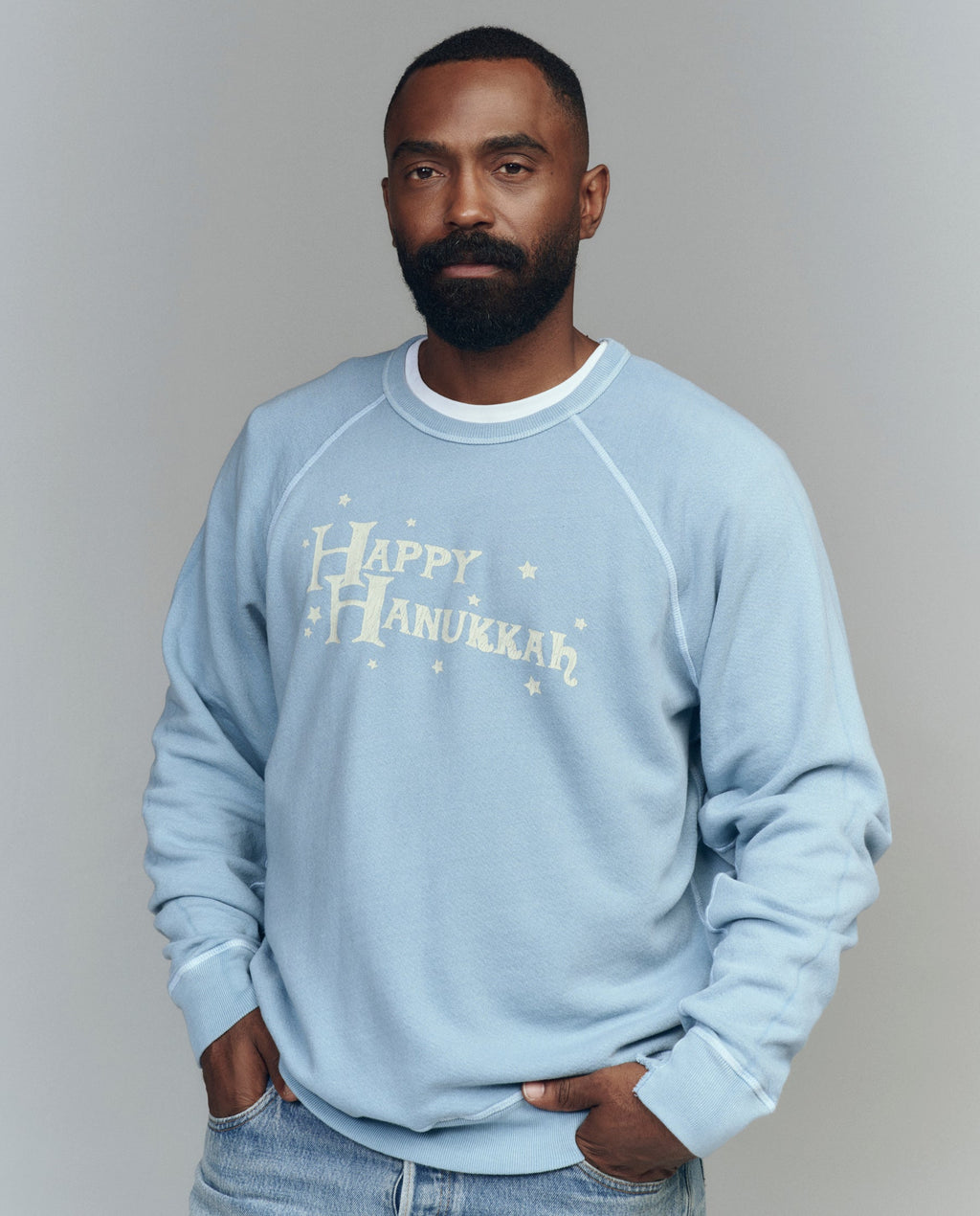 The Men's College Sweatshirt. Graphic -- Confection Blue with Happy Hannukah Graphic