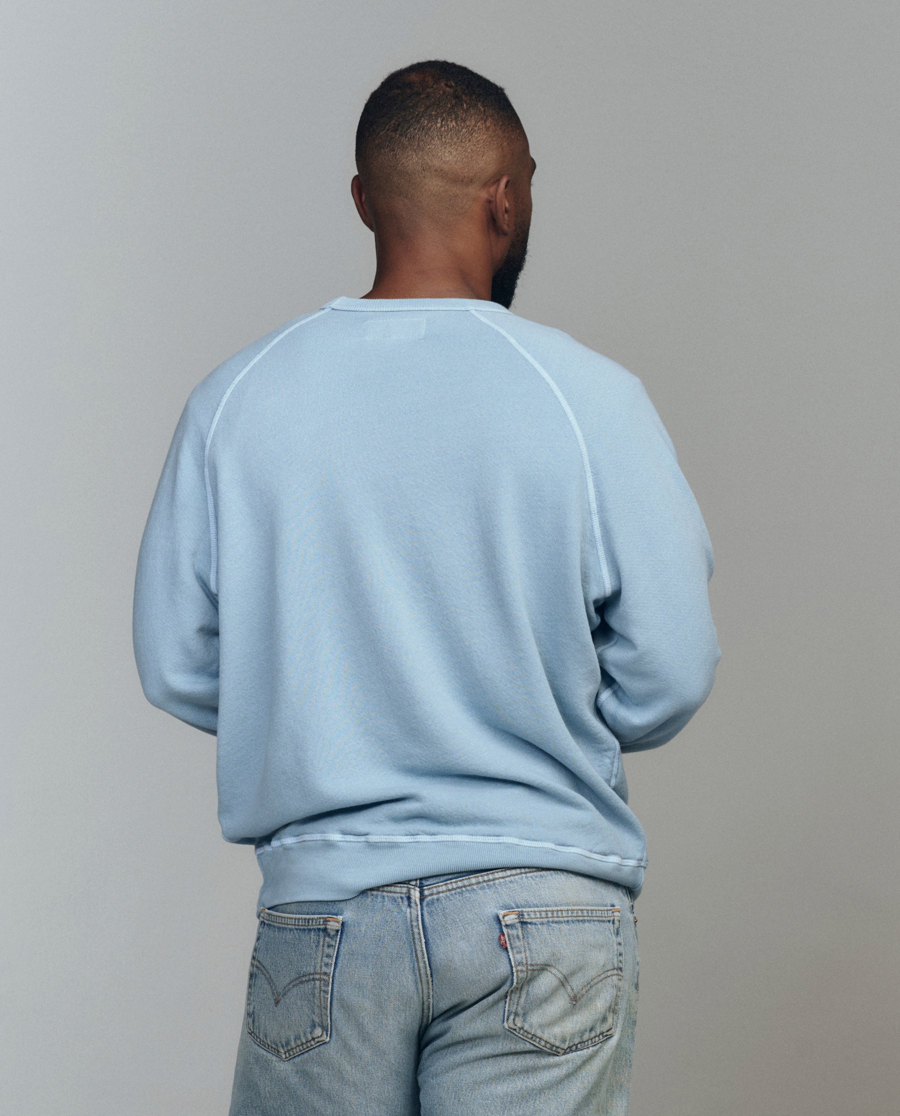 The Men's College Sweatshirt. Graphic -- Confection Blue with Happy Hannukah Graphic