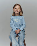 The Little College Sweatshirt. Graphic -- Confection Blue with Happy Hannukah Graphic