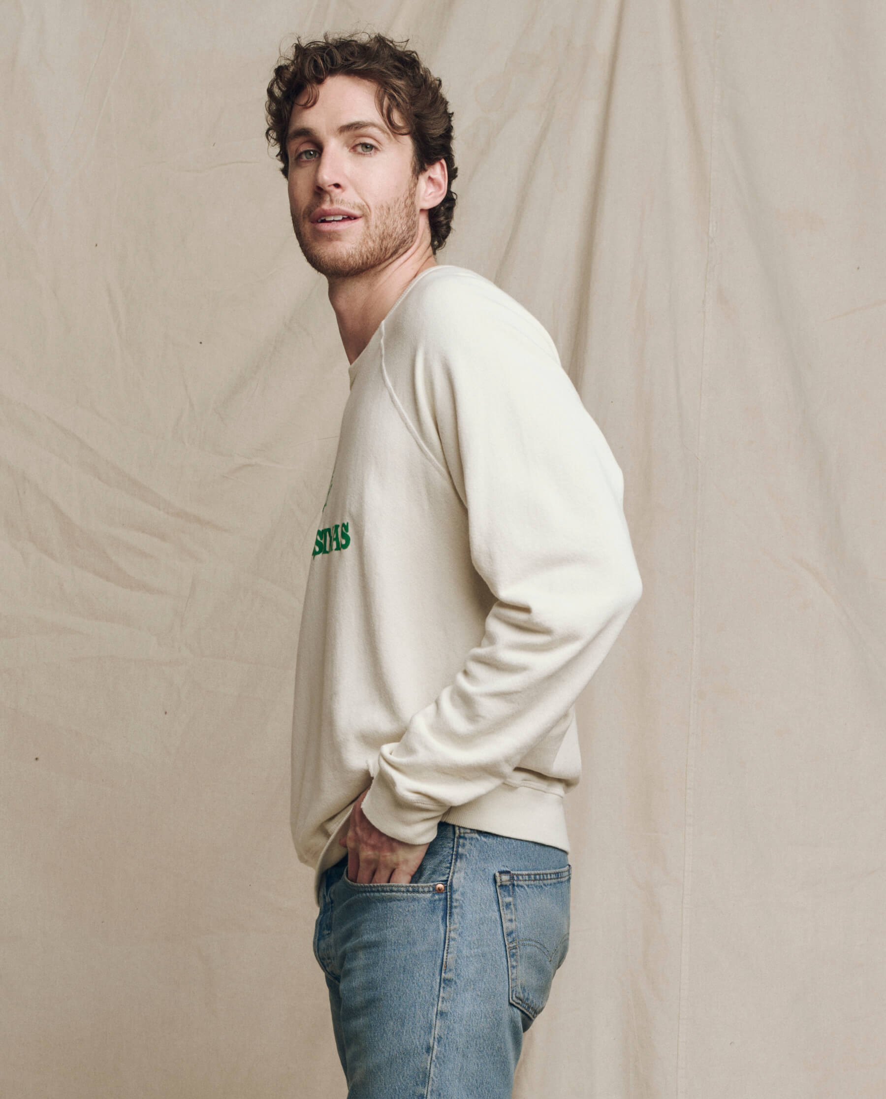 The Men's College Sweatshirt. Graphic -- Washed White with Merry Christmas Graphic