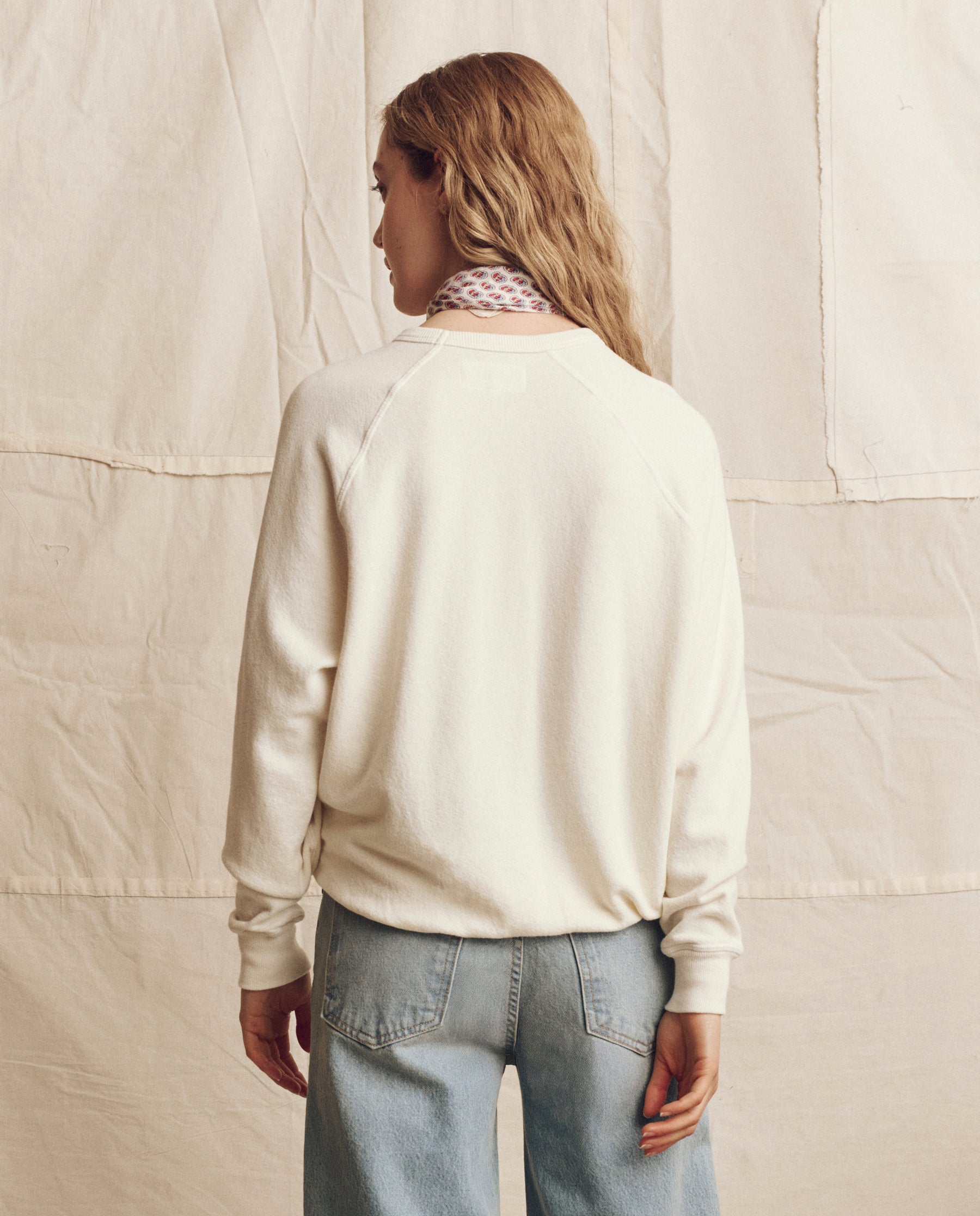 The College Sweatshirt. Novelty -- Washed White with Red Heart Graphic