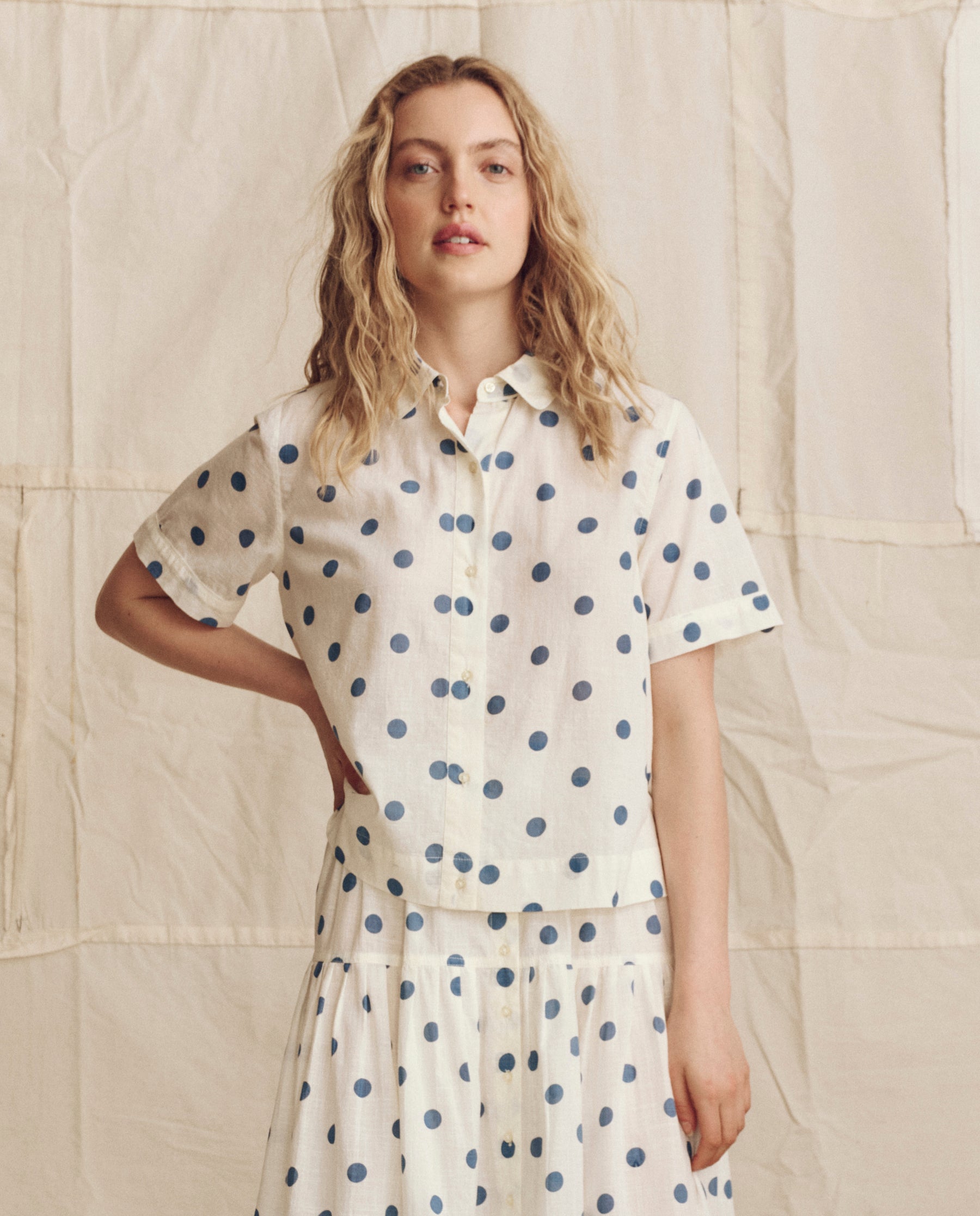 The Messenger Top. -- Cream with Blue Polka Dots