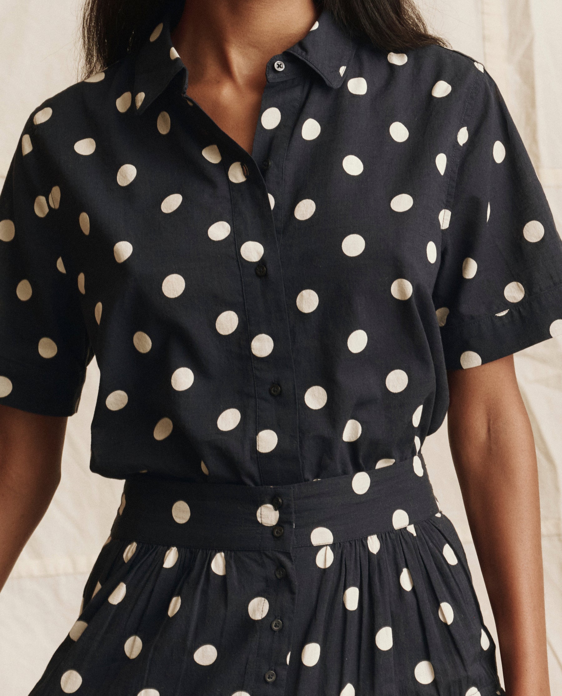 The Messenger Top. -- Navy with Cream Polka Dots