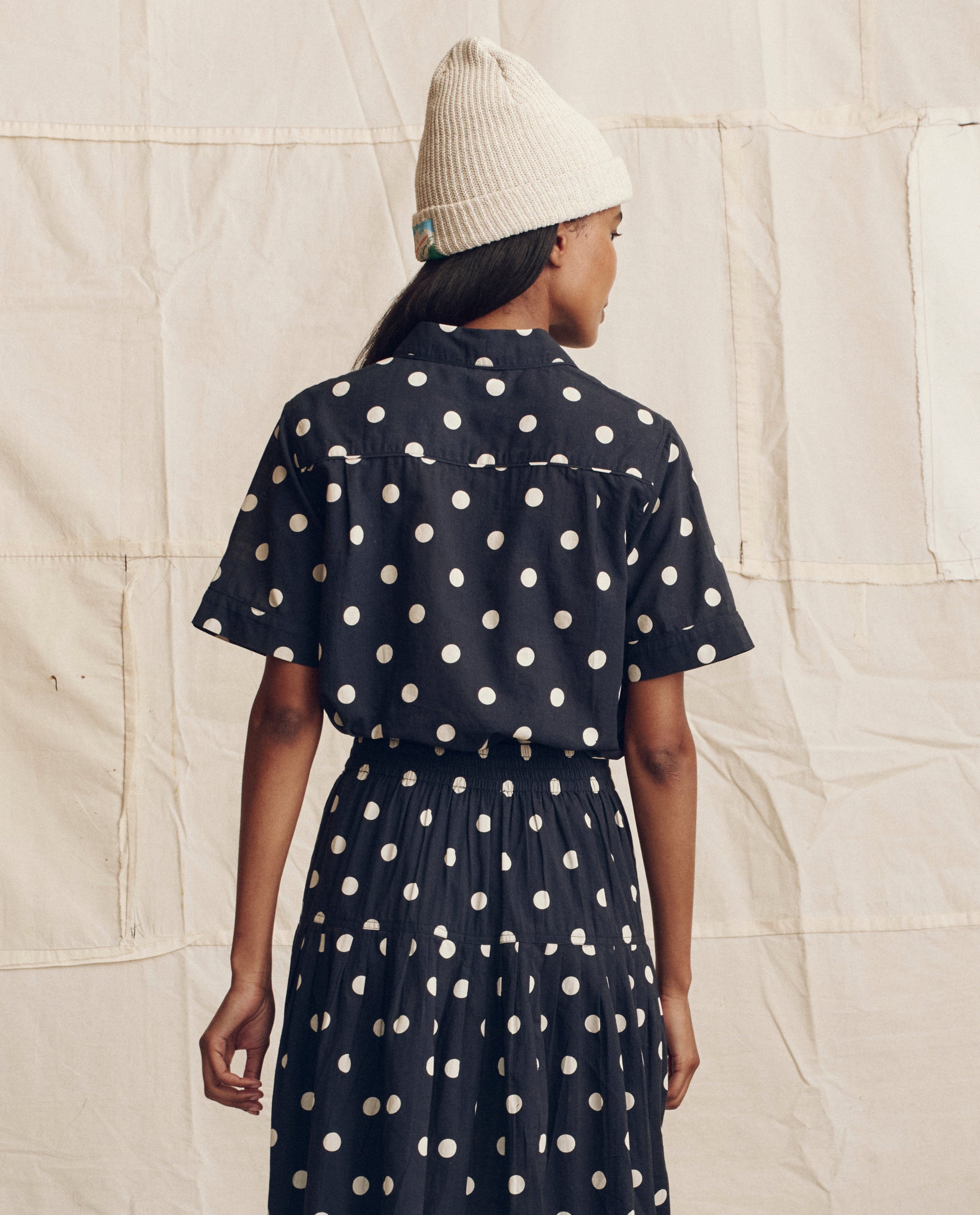 The Messenger Top. -- Navy with Cream Polka Dots