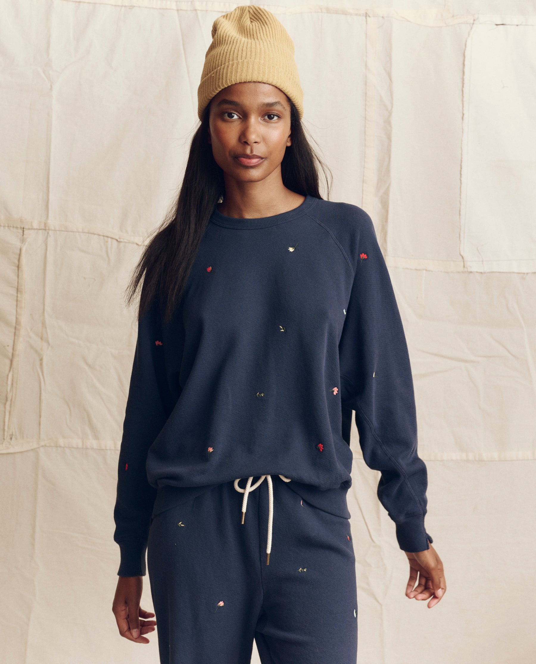 The College Sweatshirt. Embroidered -- Navy with Tossed Floral Embroidery
