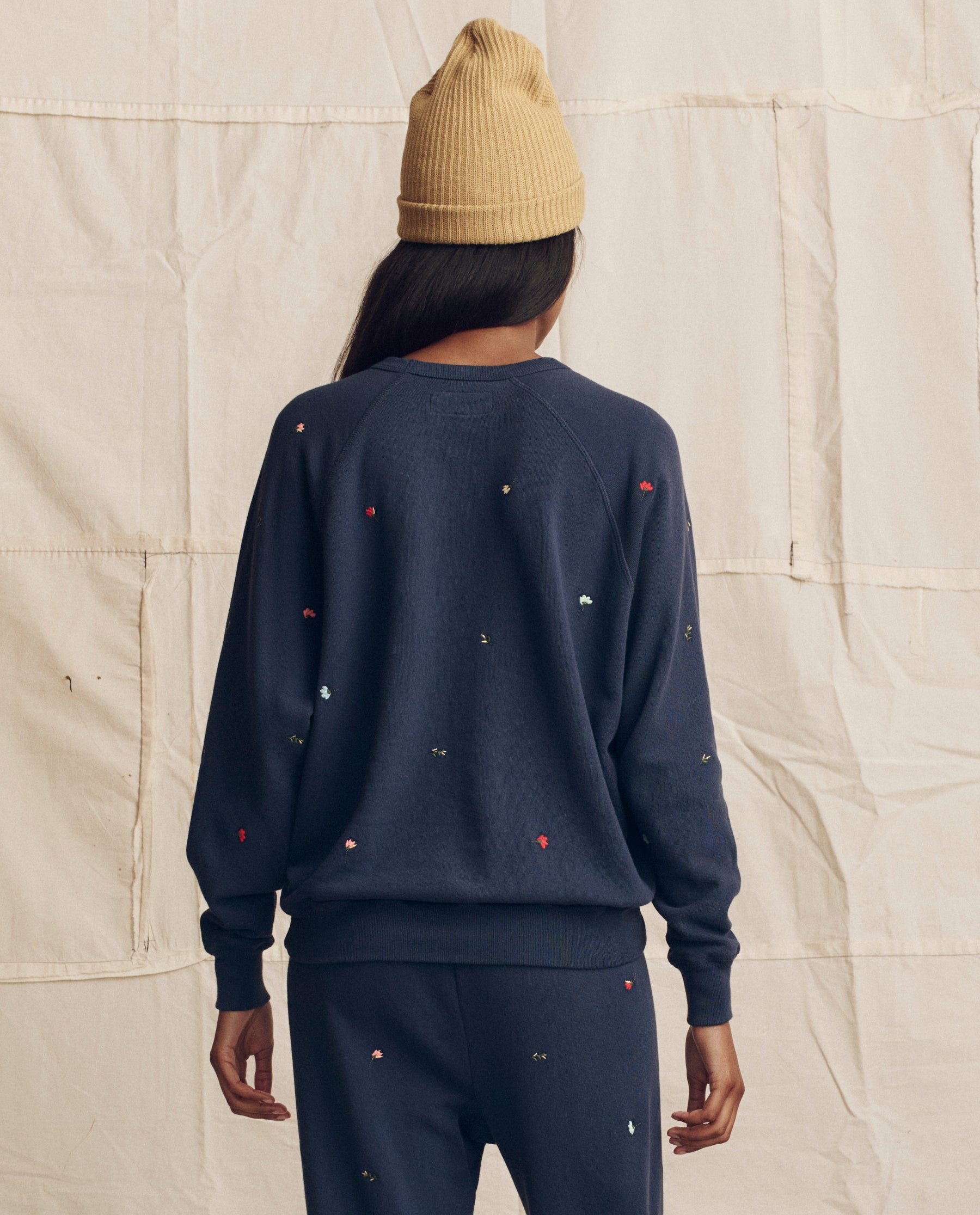 The College Sweatshirt. Embroidered -- Navy with Tossed Floral Embroidery