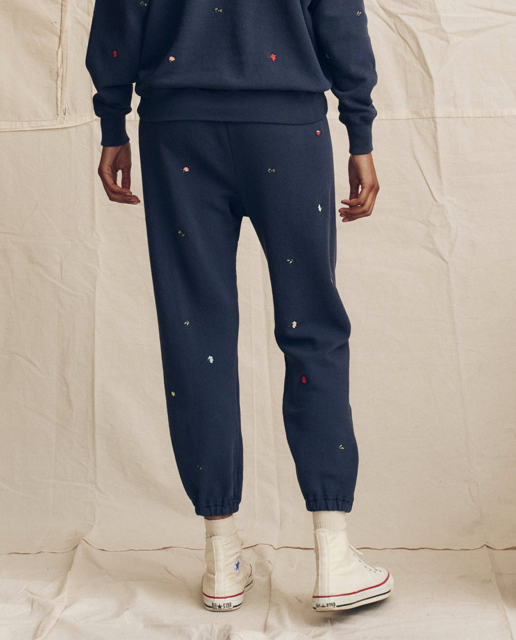 The Stadium Sweatpant. Embroidered -- Navy with Tossed Floral Embroidery