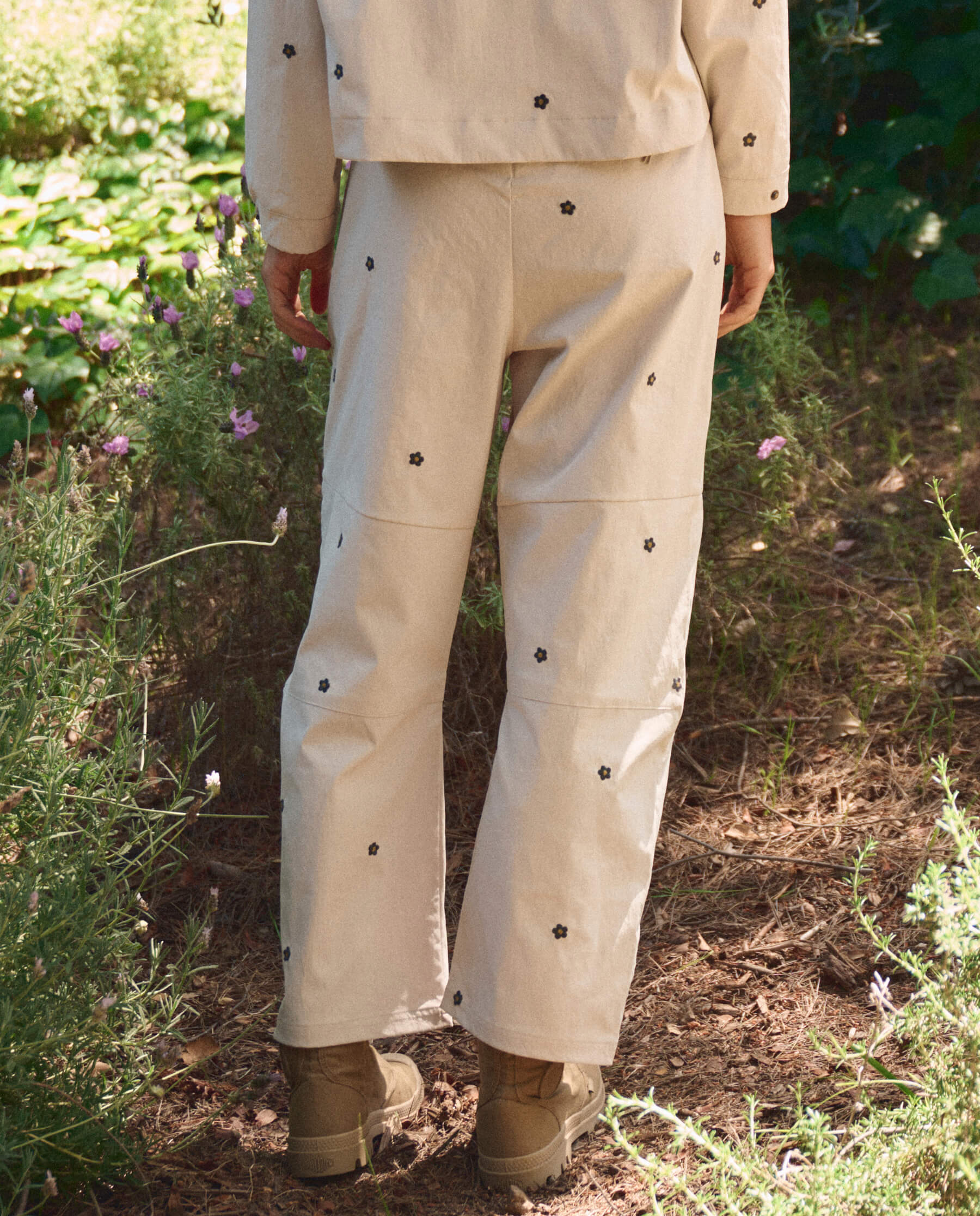 The Embroidered Outpost Pant. -- Cream With Black Daisies