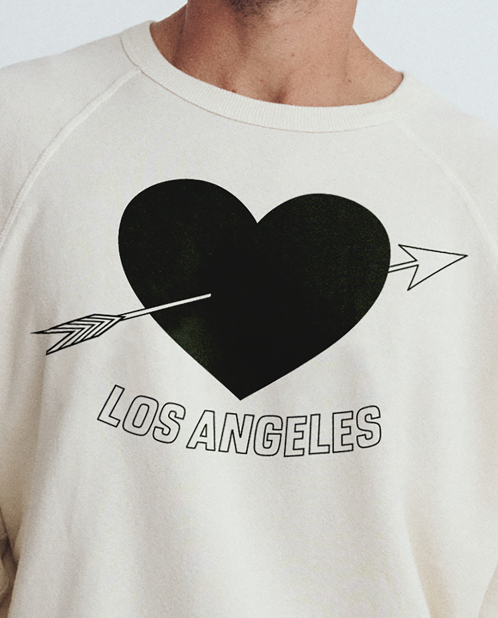 The Men's College Sweatshirt. Graphic -- Washed White with Los Angeles Heart Graphic