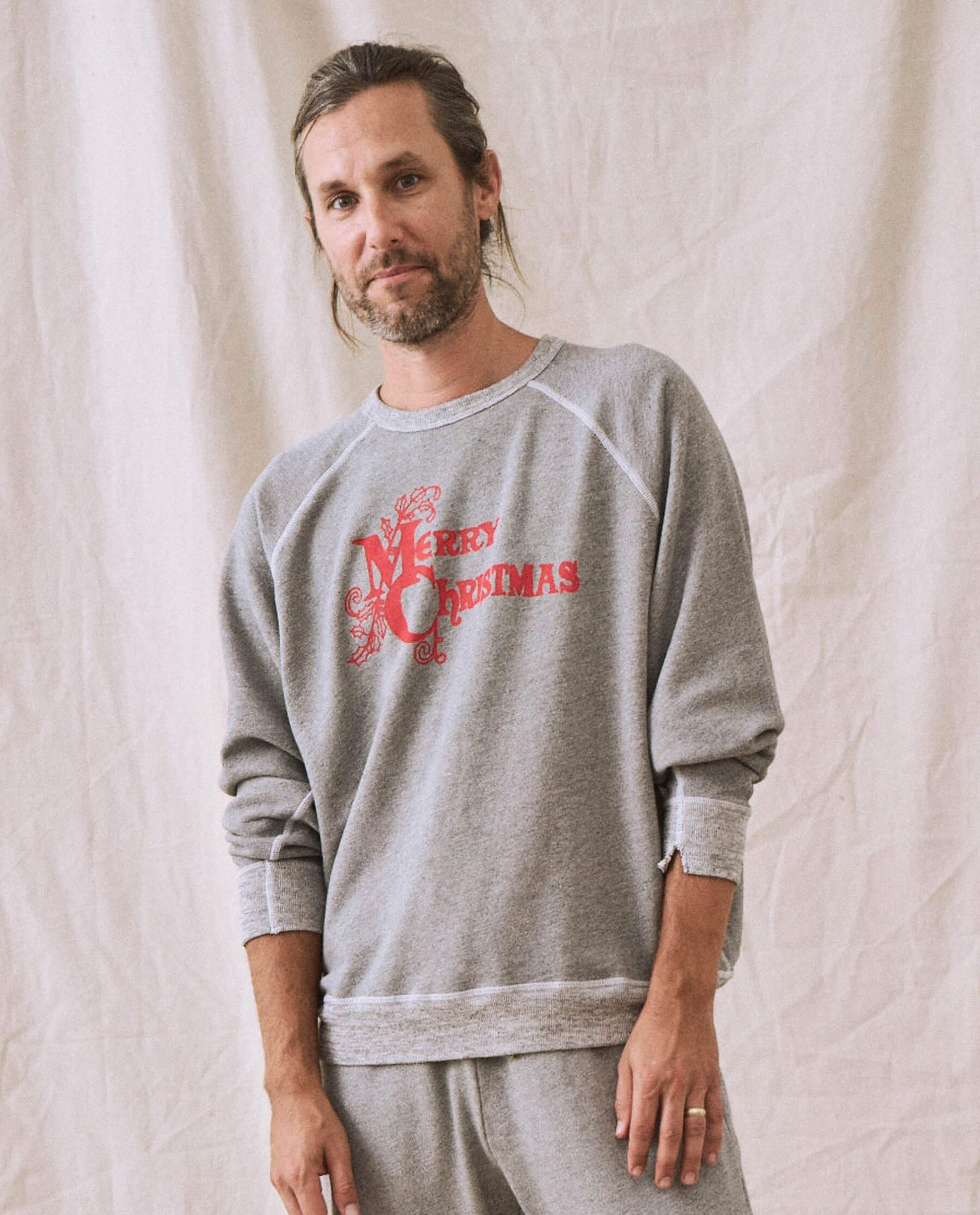The Men's College Sweatshirt. -- Varsity Grey with Christmas Graphic