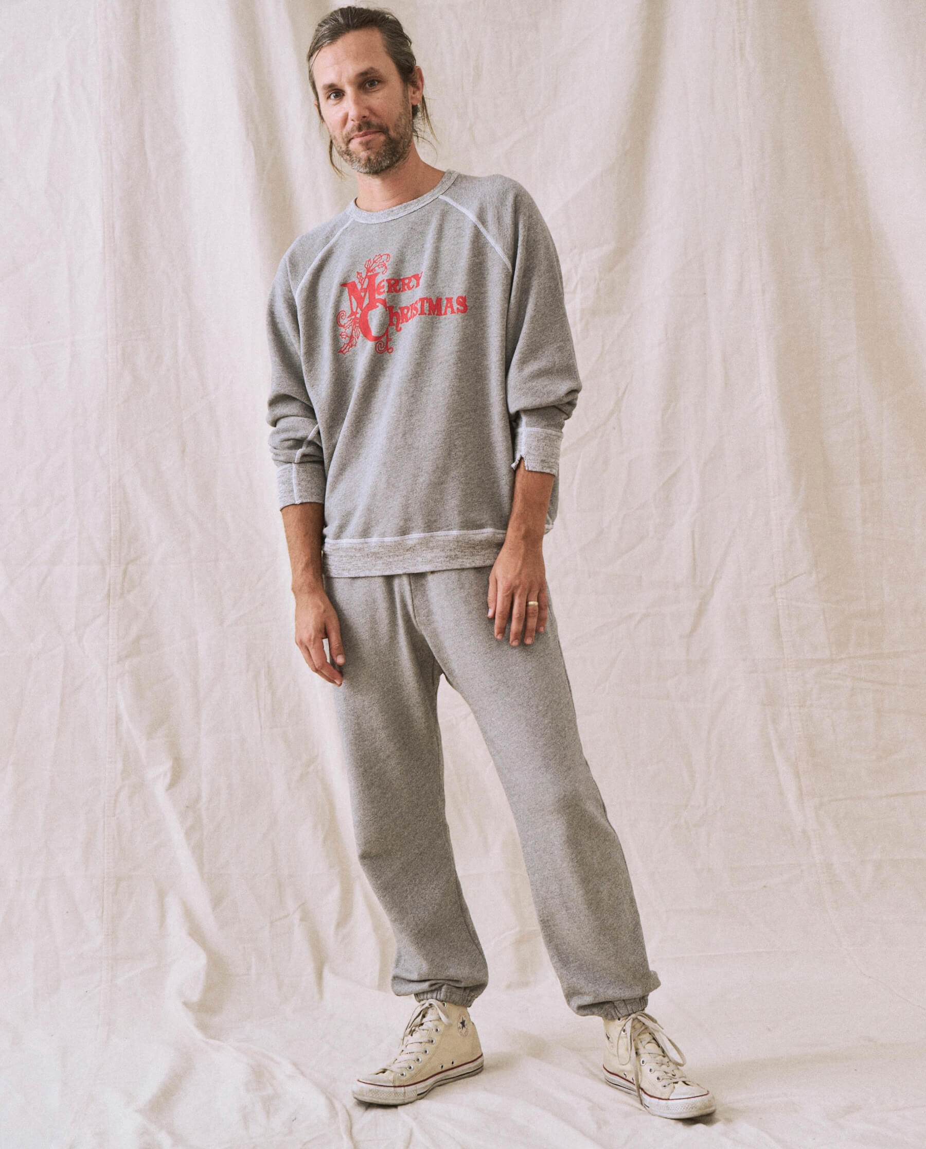 The Men's College Sweatshirt. -- Varsity Grey with Christmas Graphic