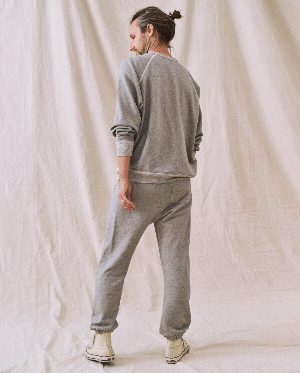 The Men's College Sweatshirt. -- Varsity Grey with Christmas Graphic