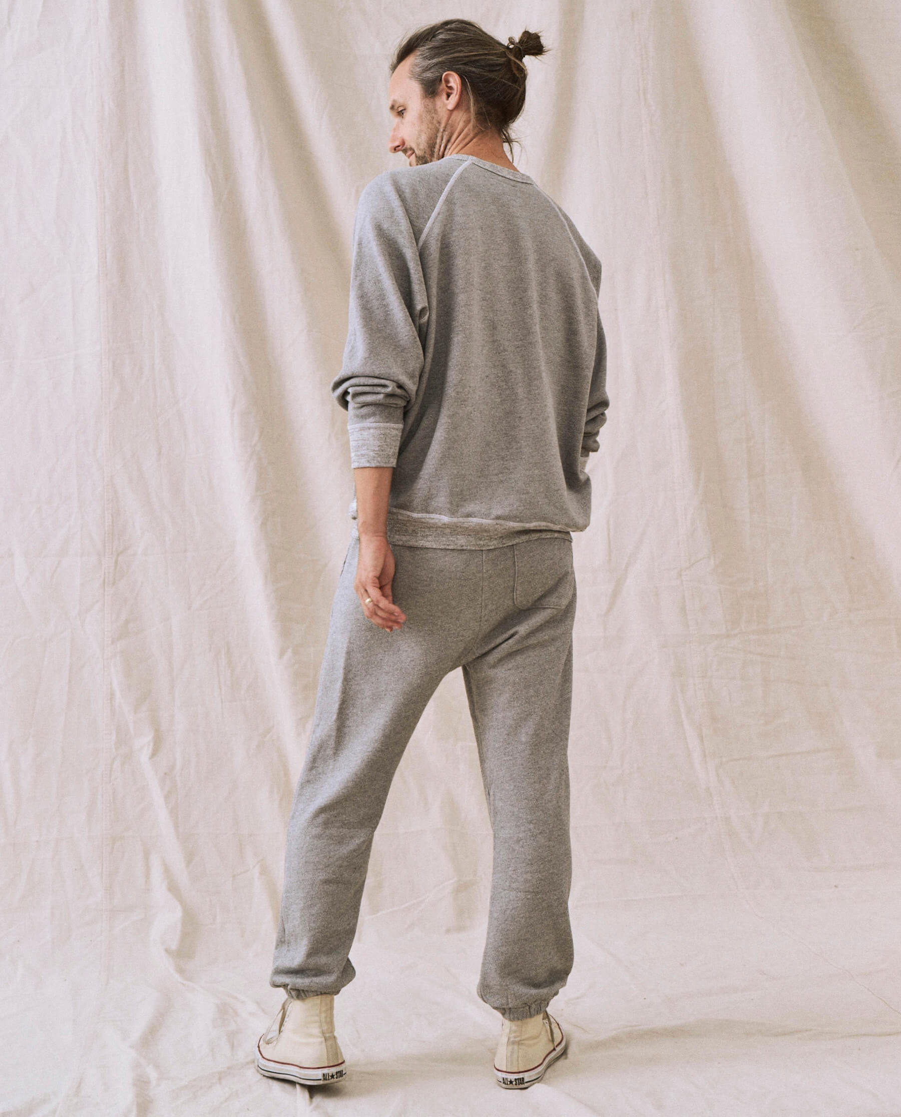 The Men's College Sweatshirt. -- Varsity Grey with Christmas Graphic