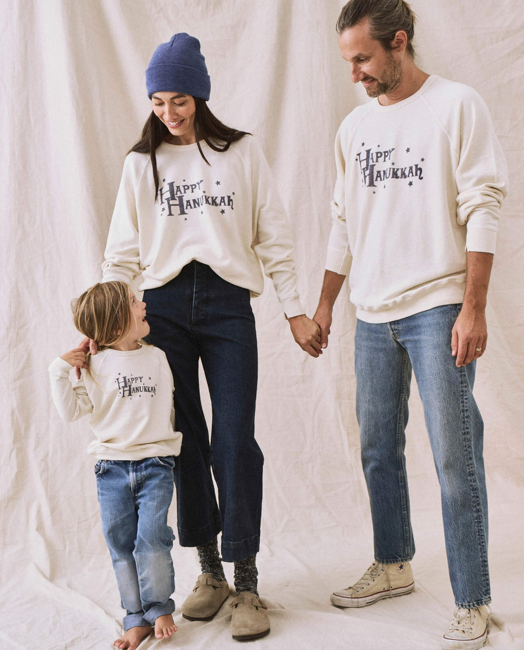 The Men's College Sweatshirt. -- Washed White with Hanukkah Graphic