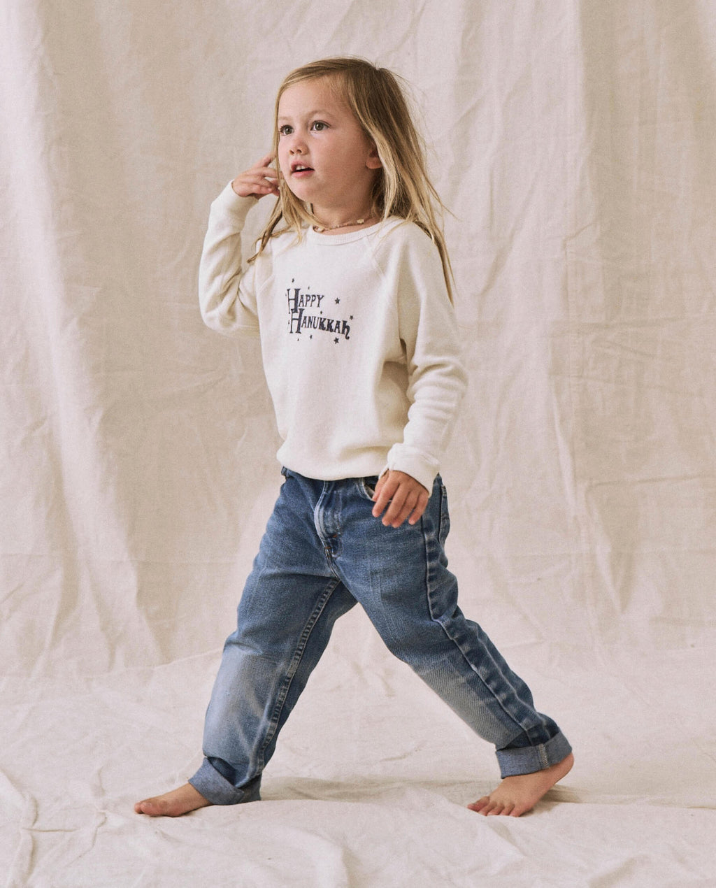 The Little College Sweatshirt. -- Washed White with Hanukkah Graphic
