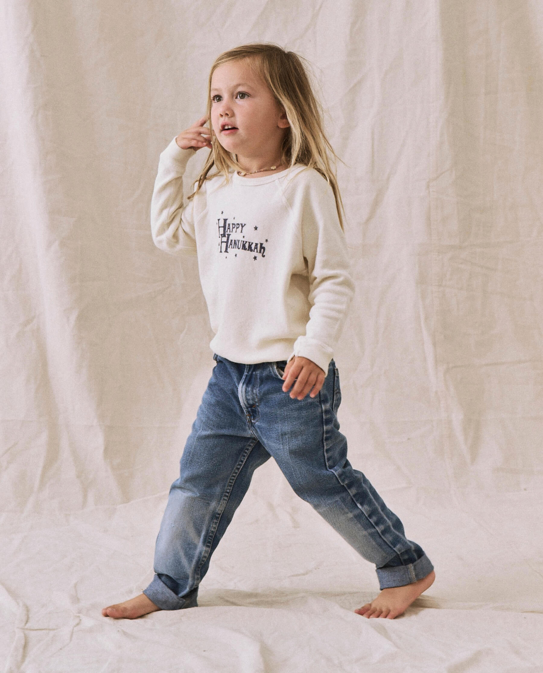 The Little College Sweatshirt. -- Washed White with Hanukkah Graphic