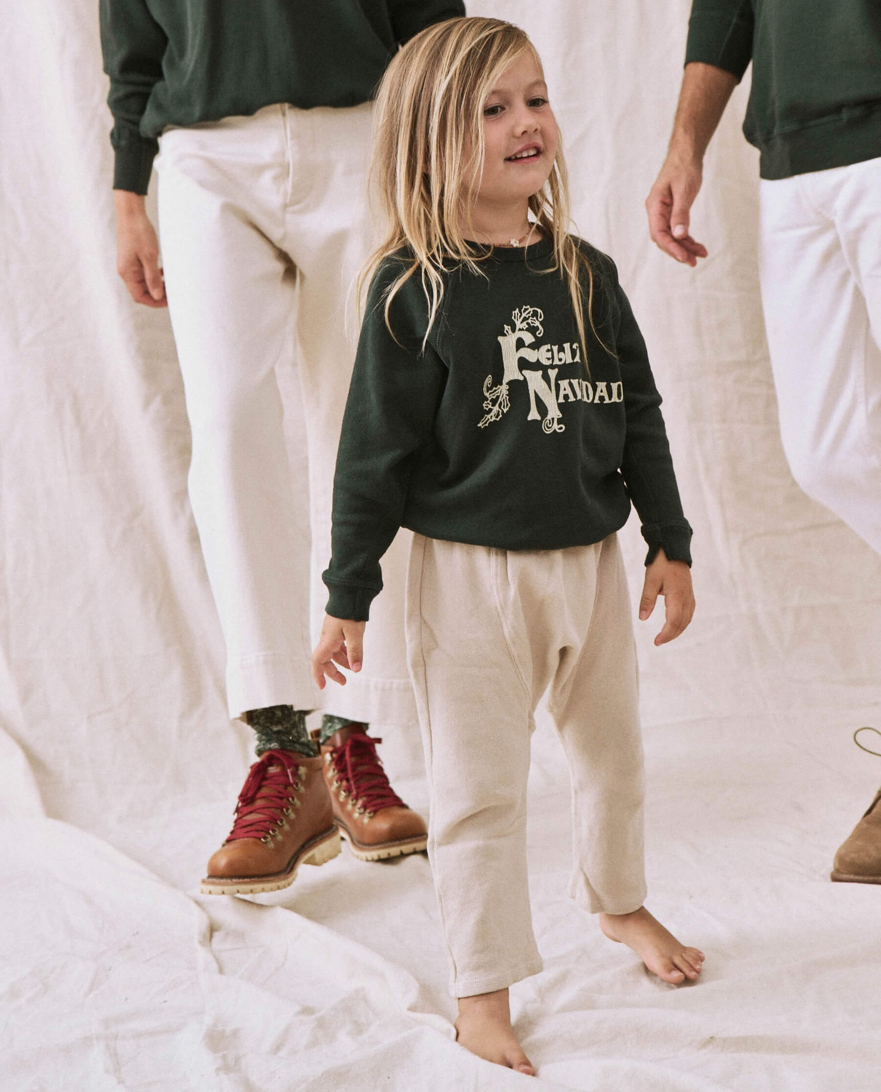 The Little College Sweatshirt. -- Dark Alpine with Feliz Navidad Graphic