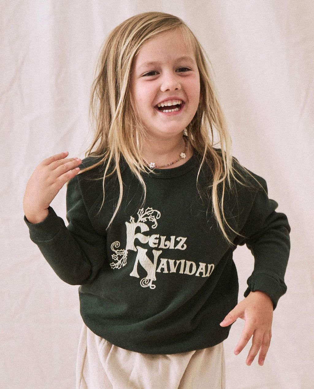 The Little College Sweatshirt. -- Dark Alpine with Feliz Navidad Graphic