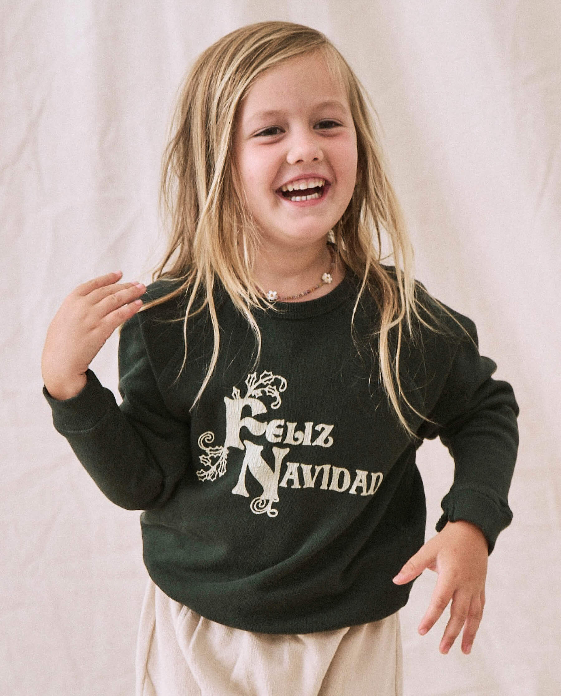The Little College Sweatshirt. -- Dark Alpine with Feliz Navidad Graphic