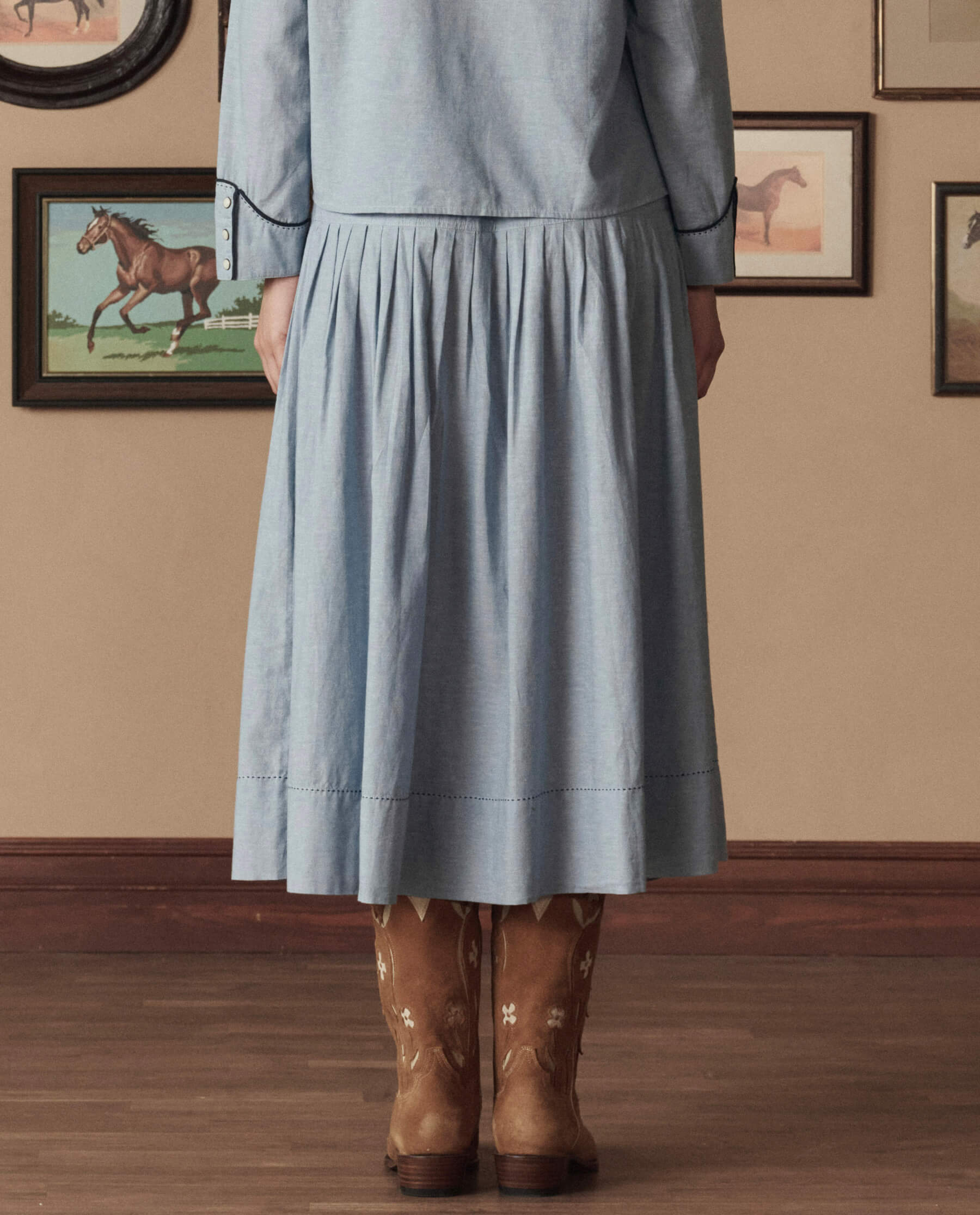 The Chambray Embroidered Highland Skirt. -- Chambray