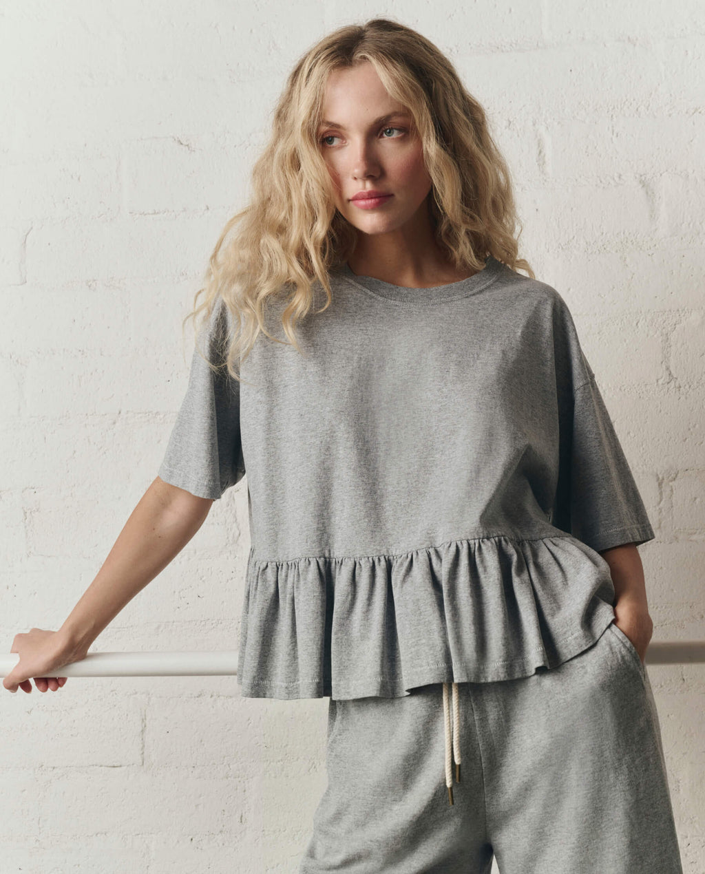 The Oversized Ruffle Peplum Tee. -- Heather Grey